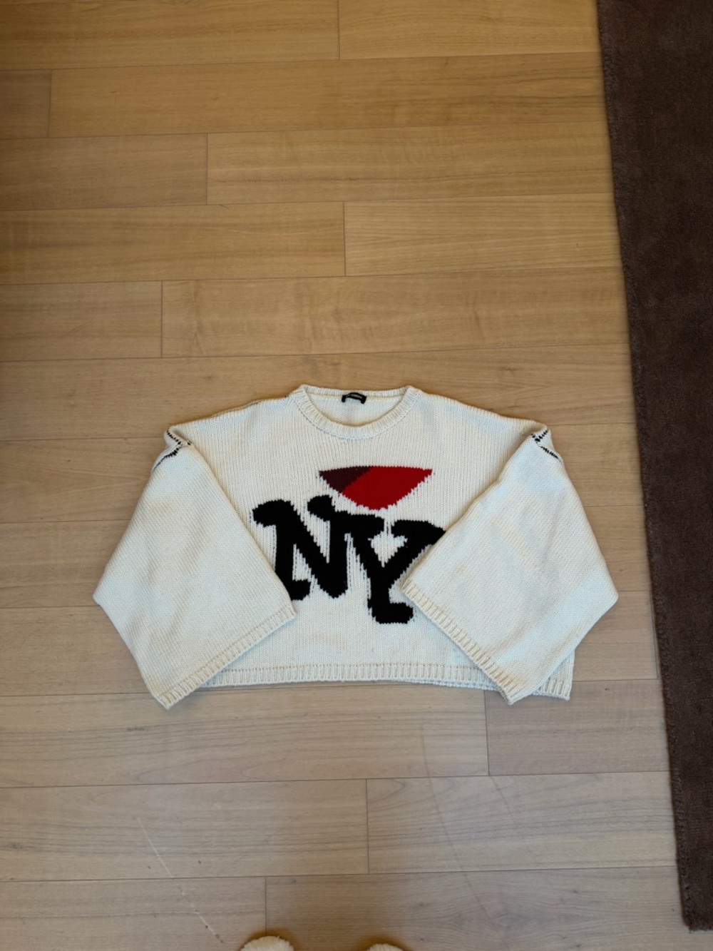 Raf Simons Cream Crewneck Sweater with Black NY Logo and Red Accent